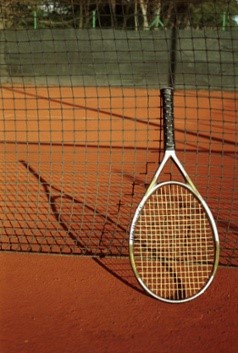 Smith Surgery-exercising on the tennis court