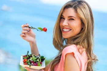 Smith Surgery-Blonde woman eating a salad